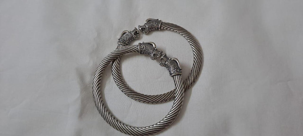 Traditional silver oxidised bangles with lion face