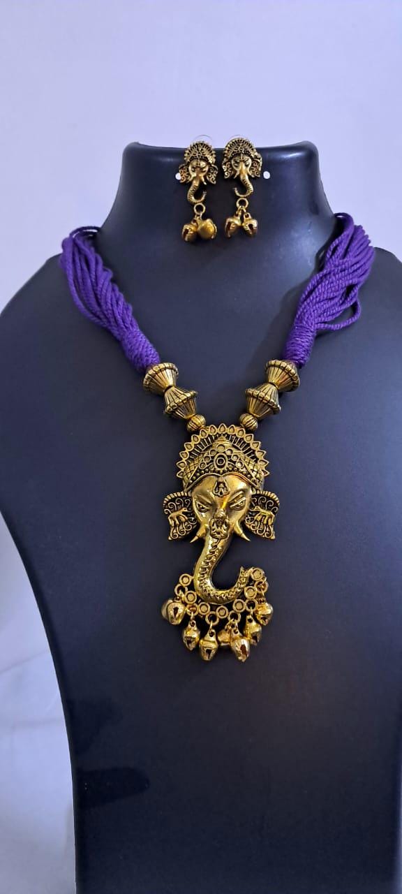Purple thread necklace with Golden oxidised traditional pendant