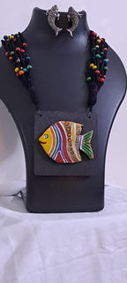 Terracotta fish pendant and thread necklace