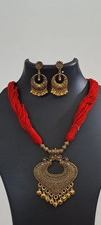 Red thread necklace with Golden oxidised traditional pendant