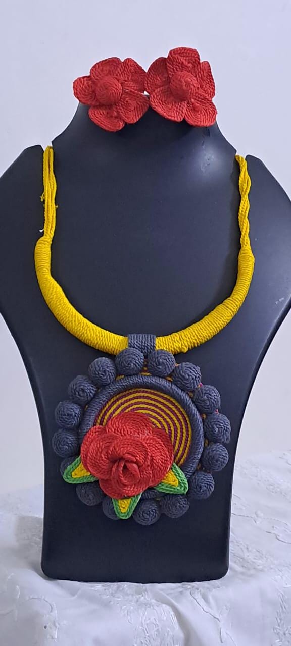 Exclusive multicoloured thread necklace set with round thread pendant n matching flower earrings