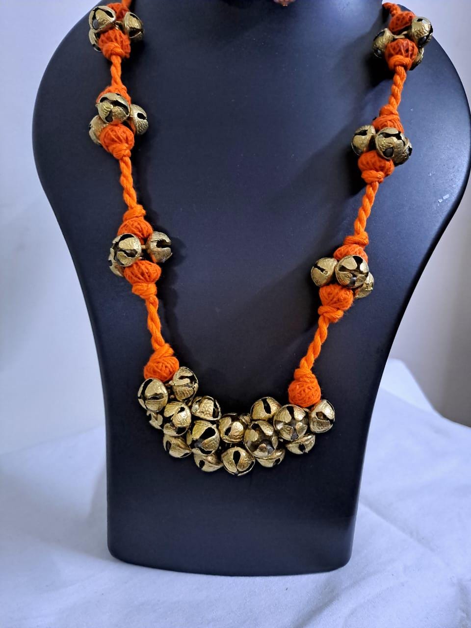 Orang thread necklace set with trinkets n matching earrings