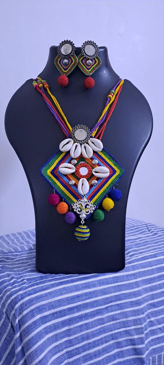 Exclusive multicoloured thread necklace set with shell n thread pendant n matching earrings