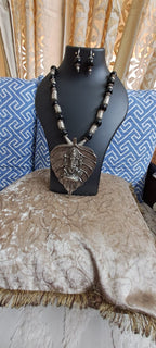 Black glass beads necklace with silver oxidised ganesha pendant