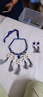 Exclusive blue n grey hasuli thread necklace set with shell fringes n matching earrings