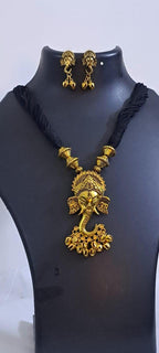 Black thread necklace with Golden oxidised traditional pendant