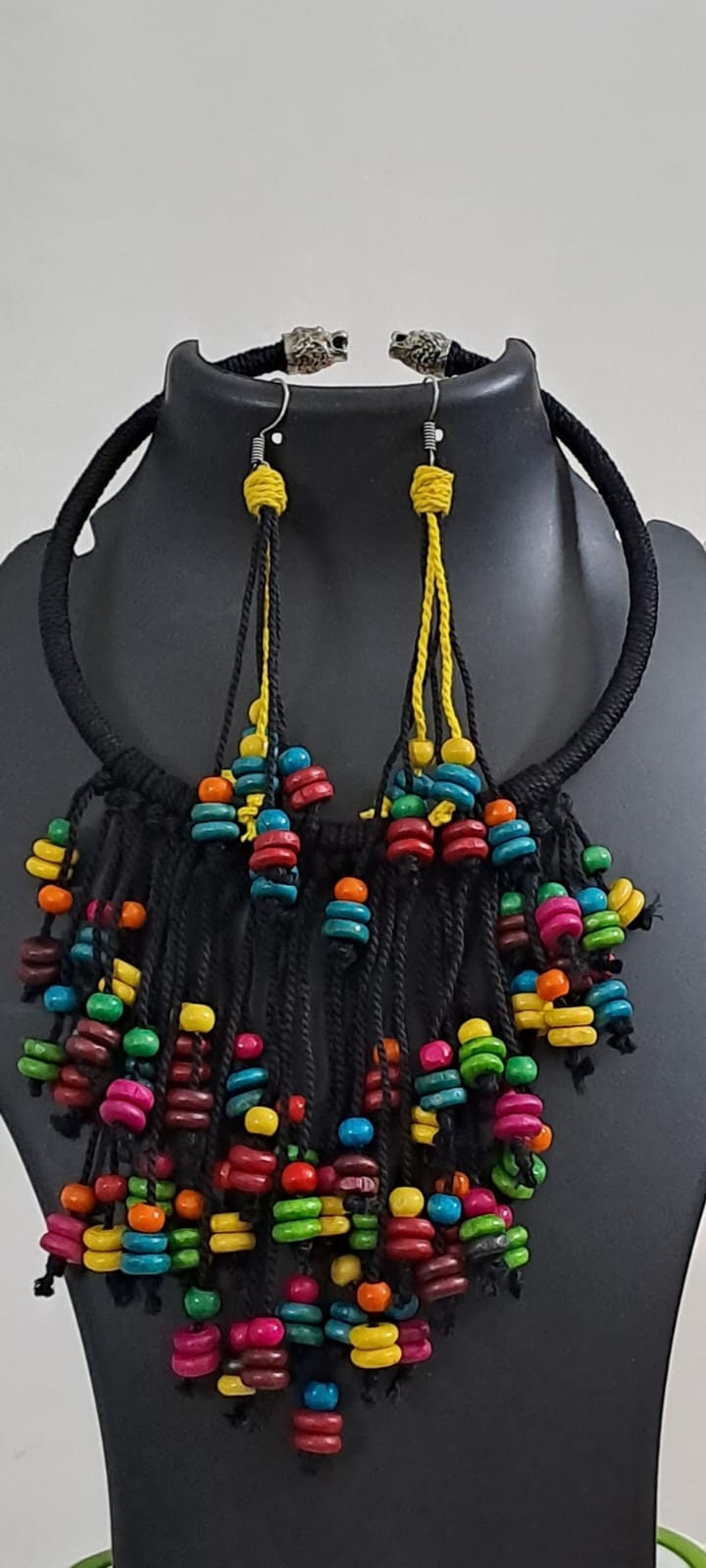 Exclusive black thread neckband with fringes and matching earrings.