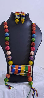 Multi coloured thread beads necklace set with dholak pendant and matching earrings