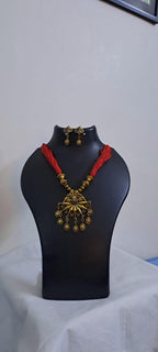 Red thread necklace with Golden oxidised traditional pendant