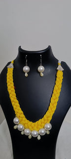 Yellow  braided thread necklace with pearl n pearl danglers