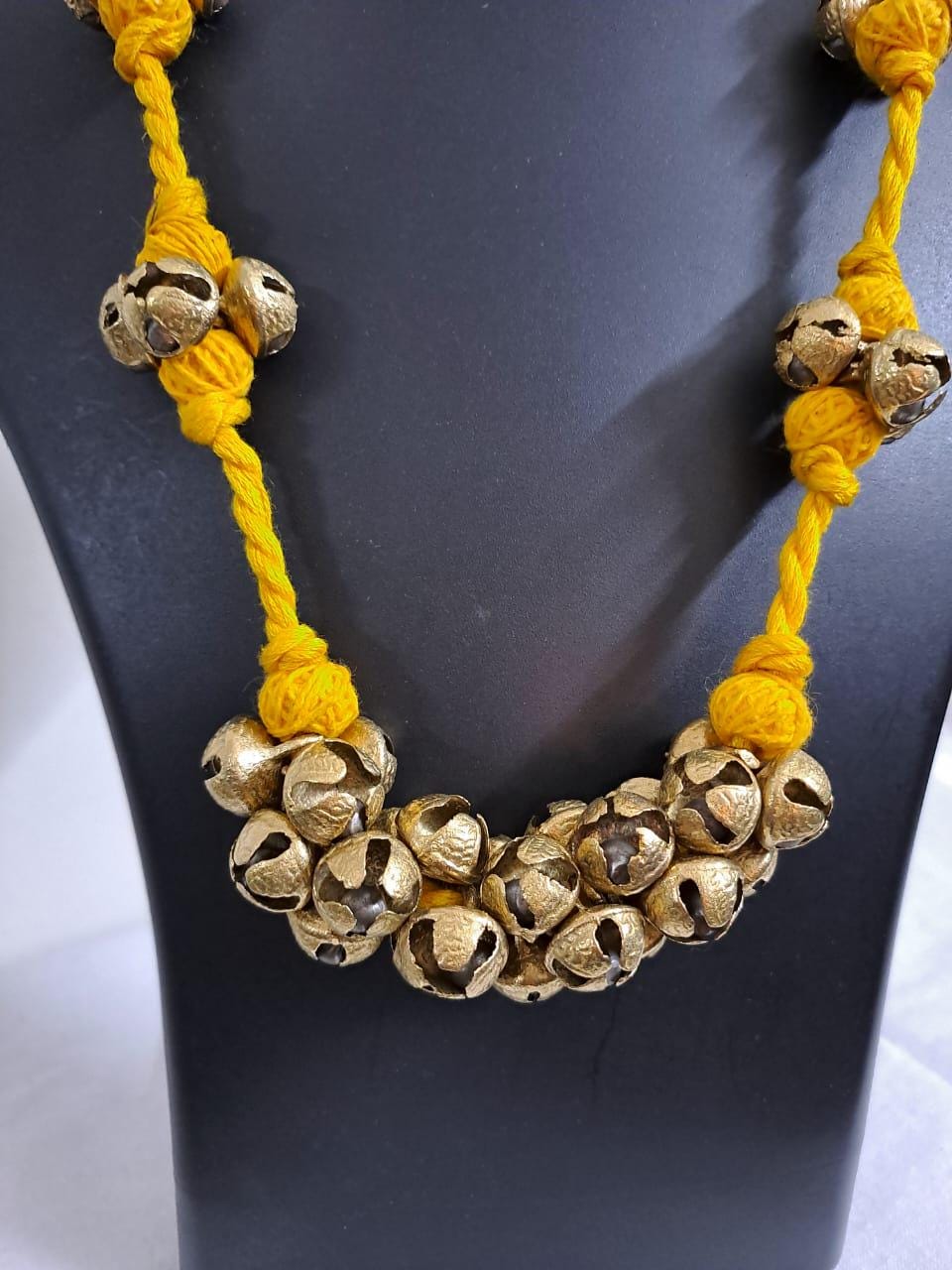 Yellow thread necklace with trinkets n matching earrings