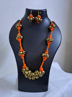 Orang thread necklace set with trinkets n matching earrings