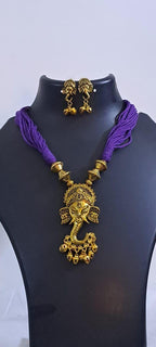 Purple thread necklace with Golden oxidised traditional pendant