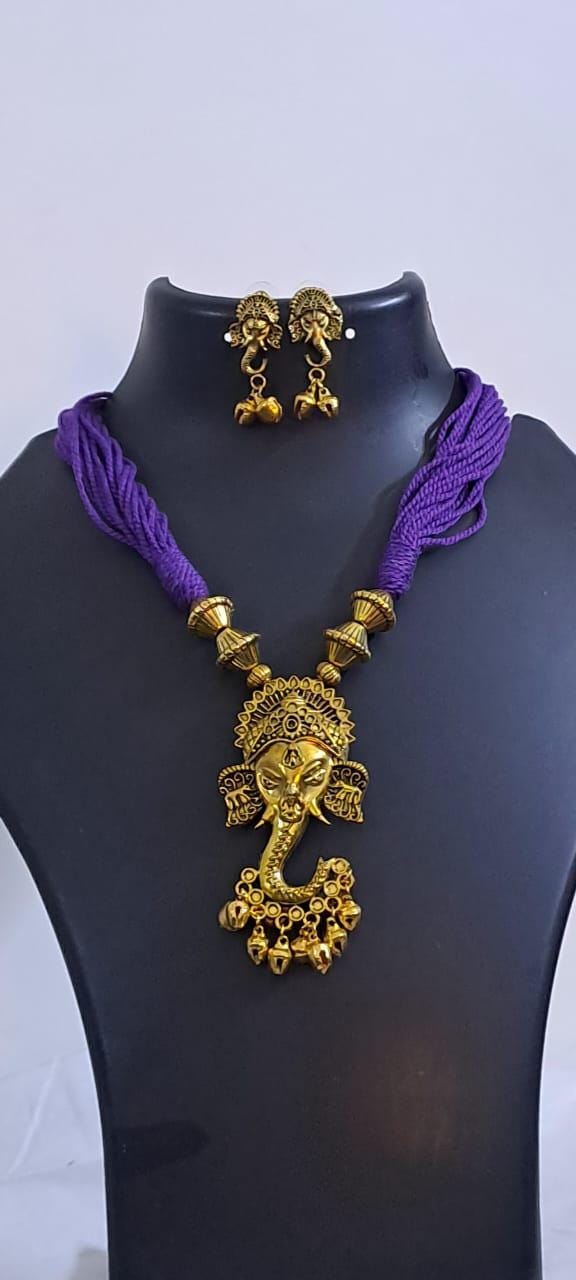 Purple thread necklace with Golden oxidised traditional pendant