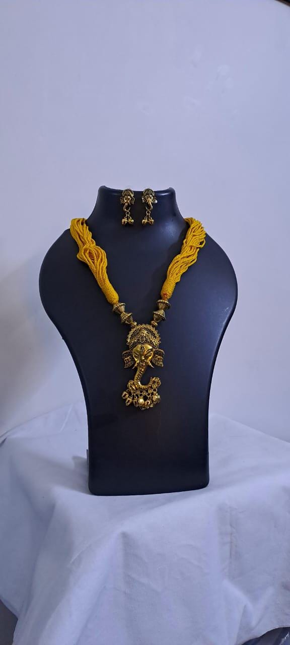 Yellow thread necklace with Golden oxidised traditional pendant