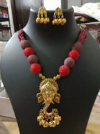 Oxidised golden ganesha traditional pendant and matching earrings.
