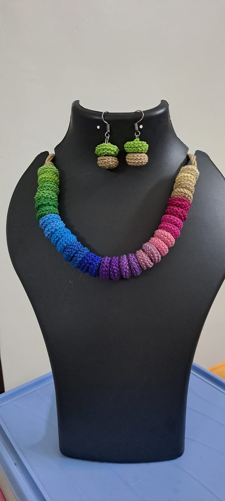 Exclusive multi coloured crochet necklace with colouful matching earrings.