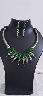 Green thread necklace with kolhapuri silver oxidised traditional beads and matching earrings