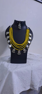 Exclusive multi layered  yellow glass beads necklace set with silver oxidised charms n matching earrings