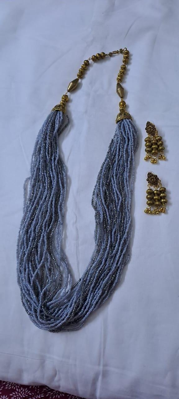 Exclusive multi layered  grey glass beads necklace set with golden oxidised matching earrings
