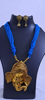 Blue thread necklace with golden oxidised ganesha pendant