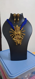 Blue thread necklace with oxidised golden durga pendant
