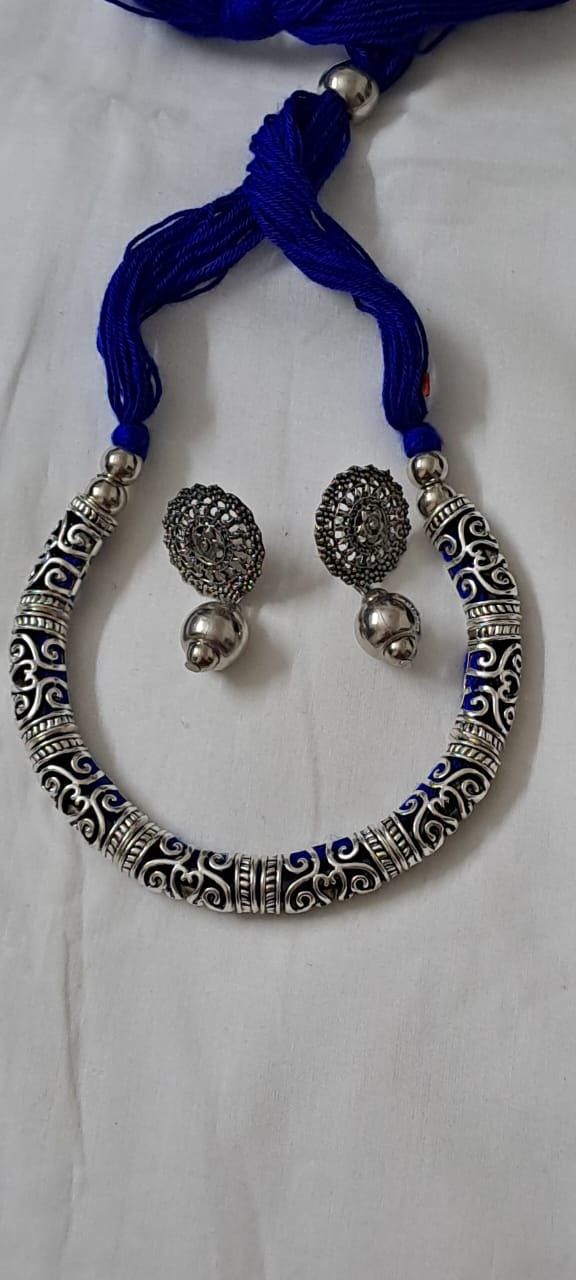 Exclusive silver oxidised hasuli set with matching earrings