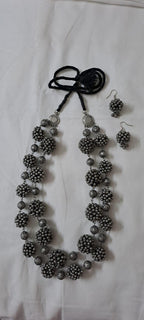 Exclusive silver oxidised long chain set with matching earrings