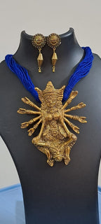 Blue thread necklace with oxidised golden durga pendant