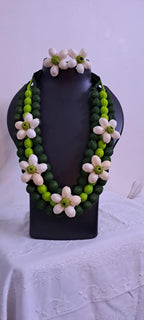 Exclusive multi-layered green fabric necklace with shells n matching earrings