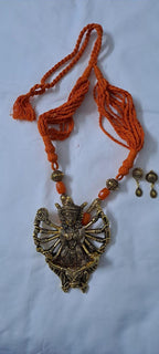 Orange thread necklace with oxidised golden durga pendant