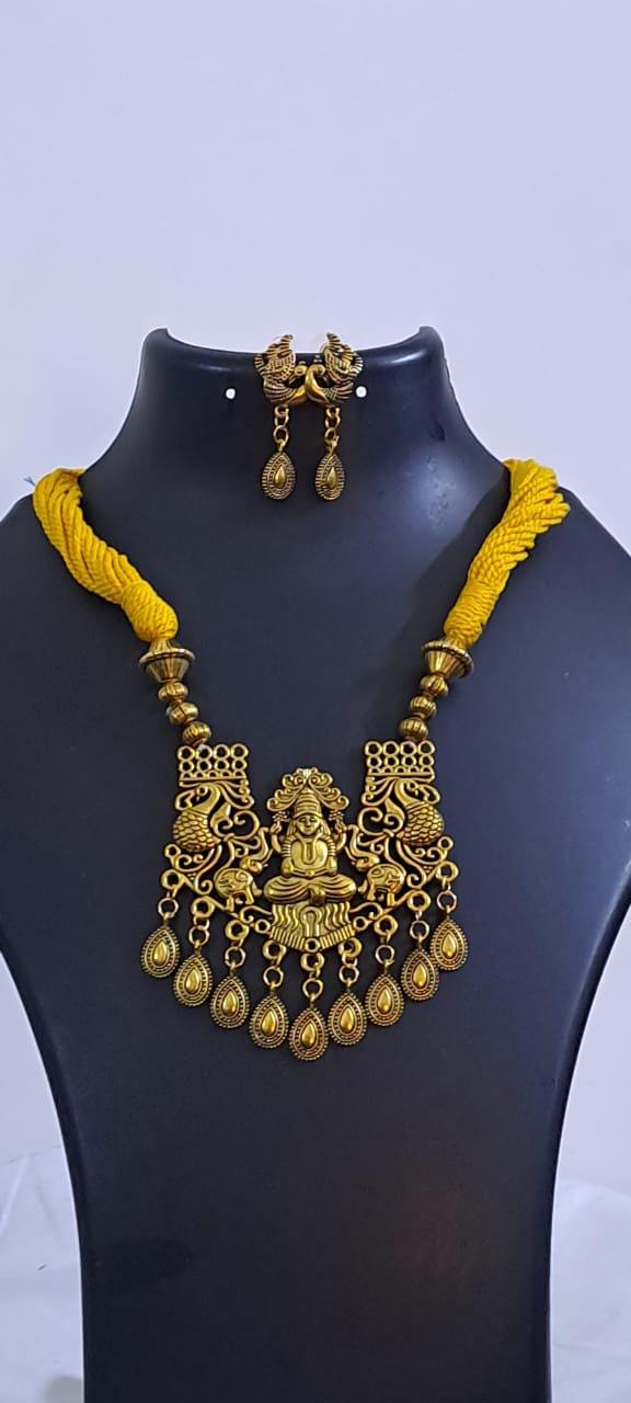 Yellow thread necklace with Golden oxidised traditional pendant