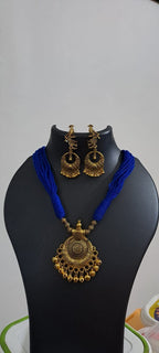 Blue thread necklace with Golden oxidised traditional pendant