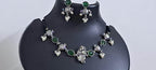 Exclusive silver oxidised lstone necklace with radha krishna pendant with matching earrings
