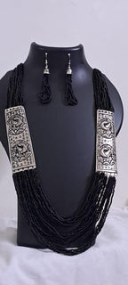 Exclusive silver oxidised set with layers of black seed beads n matching earrings