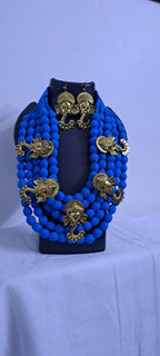 Multilayered fabric beads set with golden oxidised goddess Durga pendants - Blue
