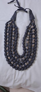 Exclusive multi-layered light grey fabric necklace