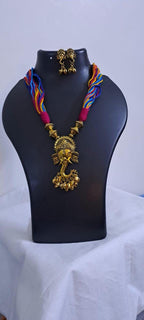 Multicoloured thread necklace with Golden oxidised traditional pendant