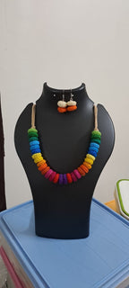 Exclusive multi coloured crochet necklace with colouful matching earrings.