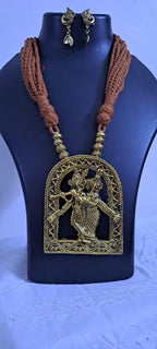 Radha Krishna golden oxidised pendant necklace in brown tread with matching earrings