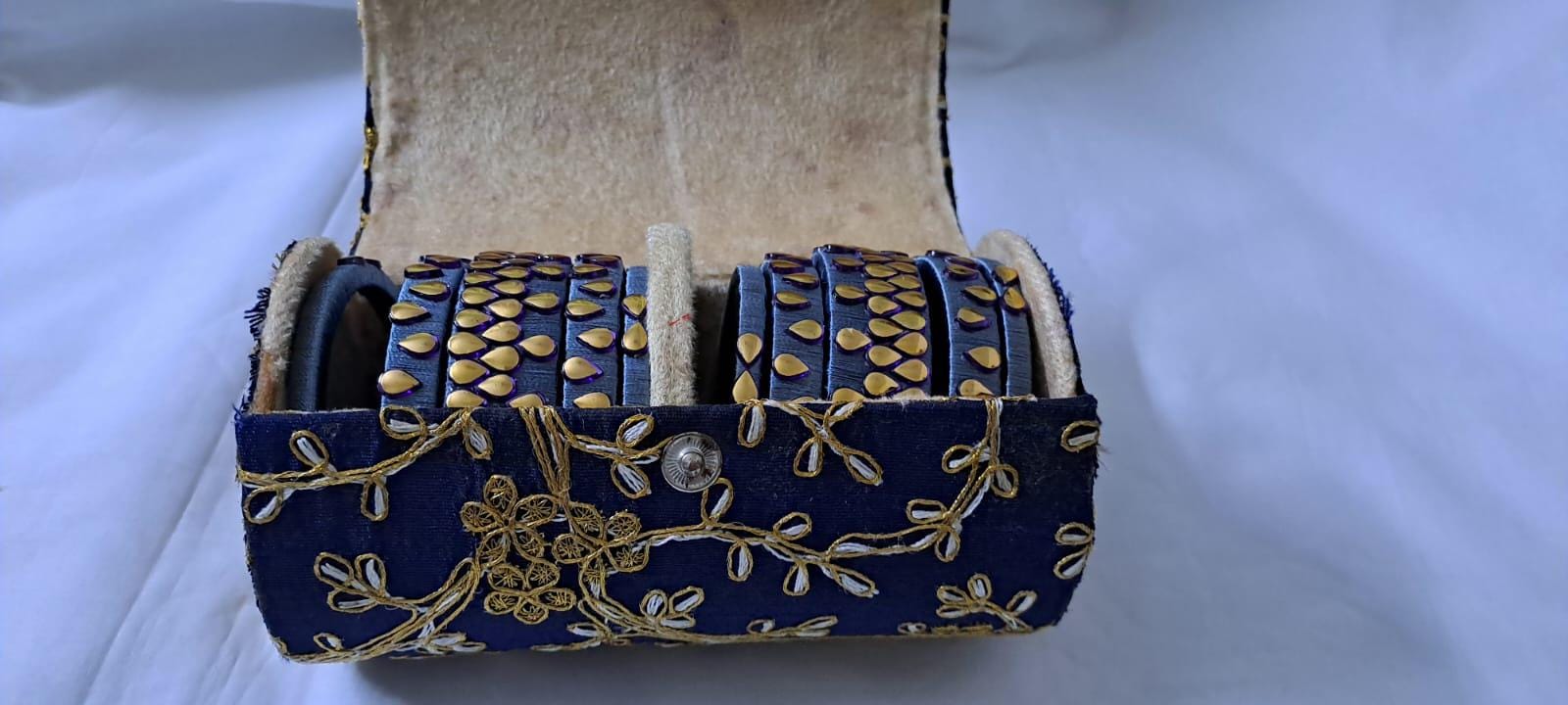 Grey colour traditional thread kundan bangles with zari bangle box