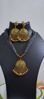 Grey thread necklace with Golden oxidised traditional pendant