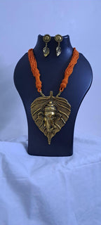 Orange thread necklace with golden oxidised ganesha pendant