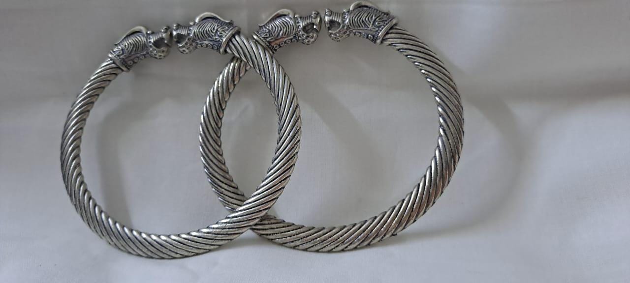 Traditional silver oxidised bangles with lion face