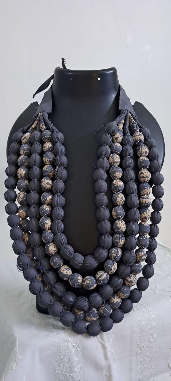 Exclusive multi-layered light grey fabric necklace