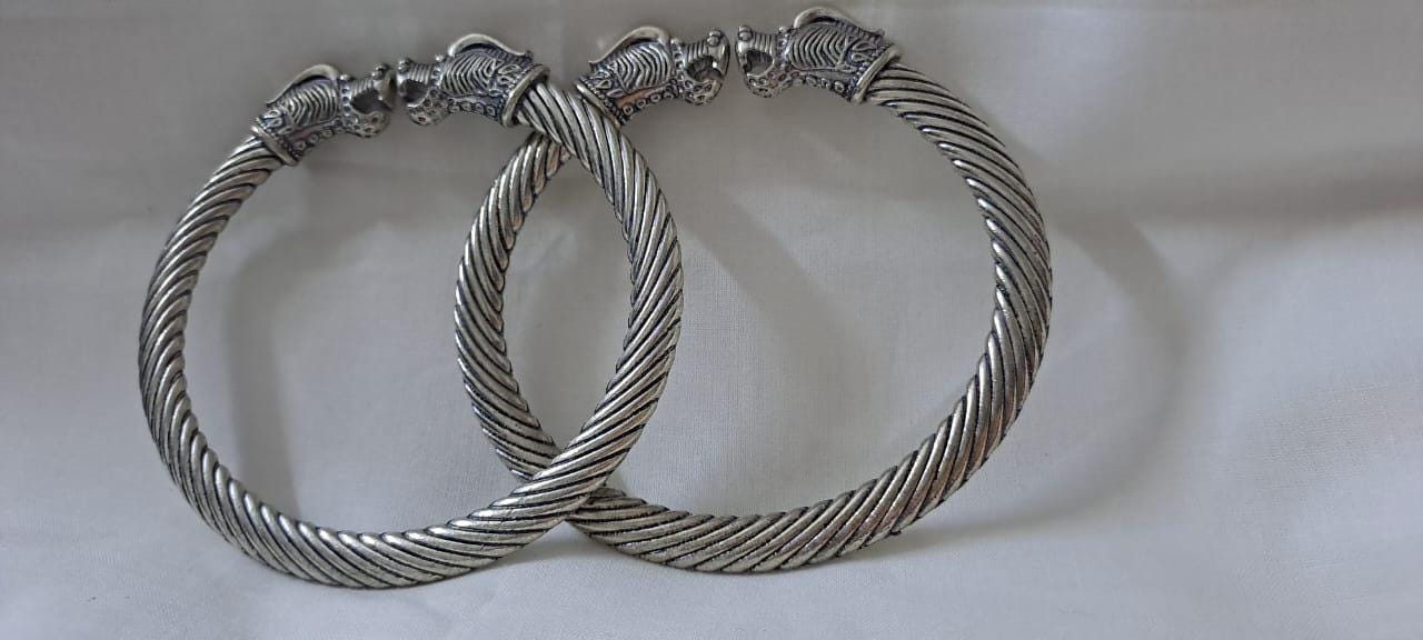 Traditional silver oxidised bangles with lion face