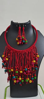 Exclusive red thread neckband with fringes and matching earrings.