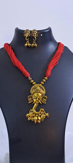 Red thread necklace with Golden oxidised traditional pendant