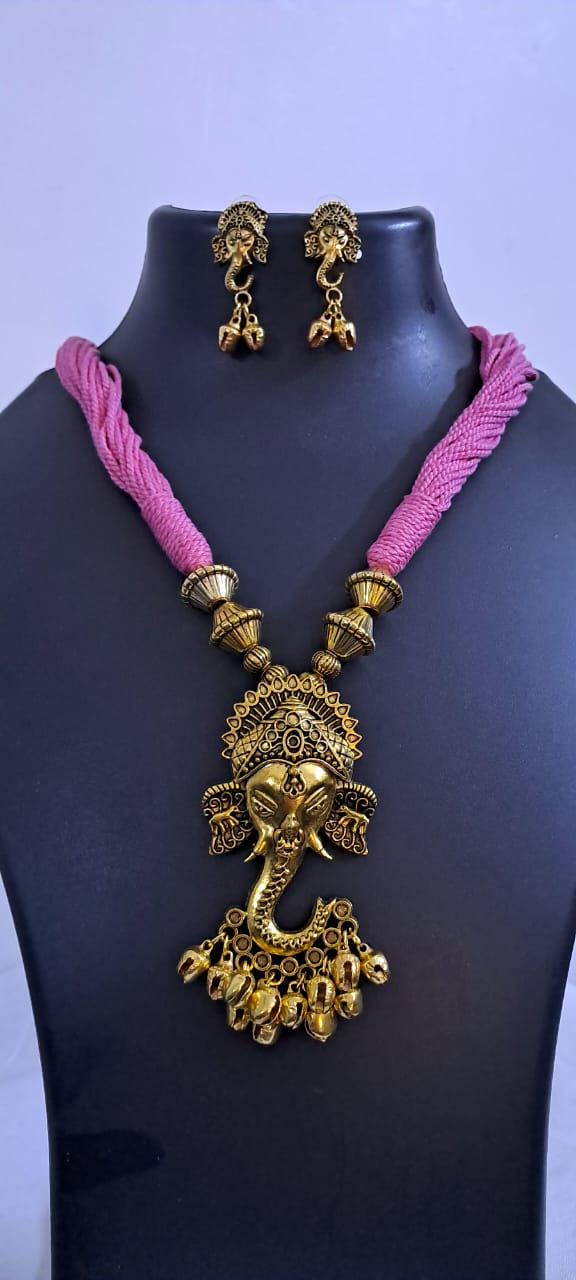 Pink thread necklace with Golden oxidised traditional pendant