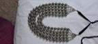 Multi-layered silver oxidised beads necklace .
